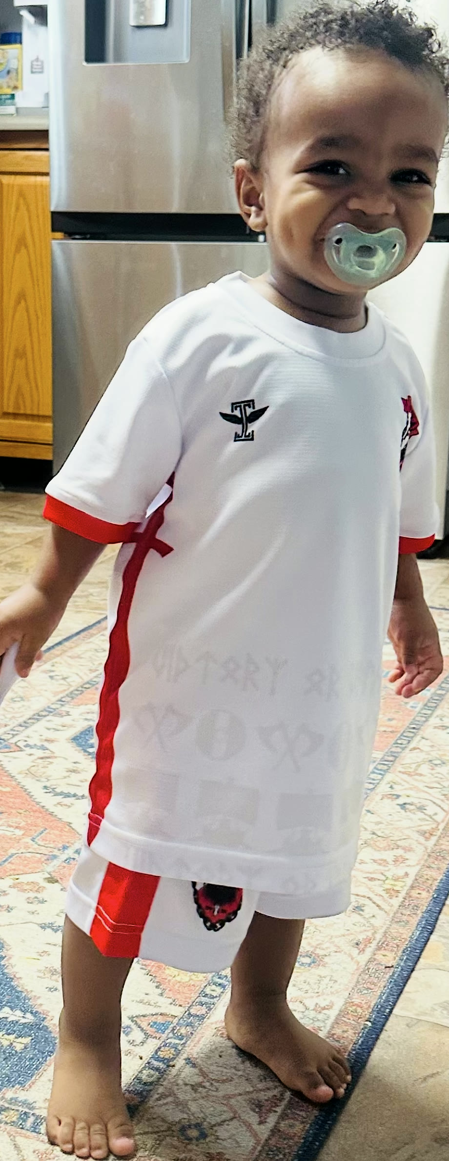 A young Valhalla in the white and red home kit
